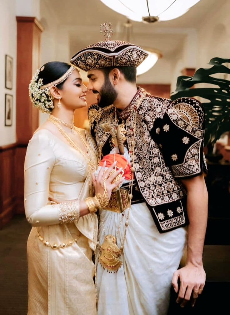 Sinhala Buddhist couple in traditional wedding attire — SubaMangala Sri Lanka matrimony
